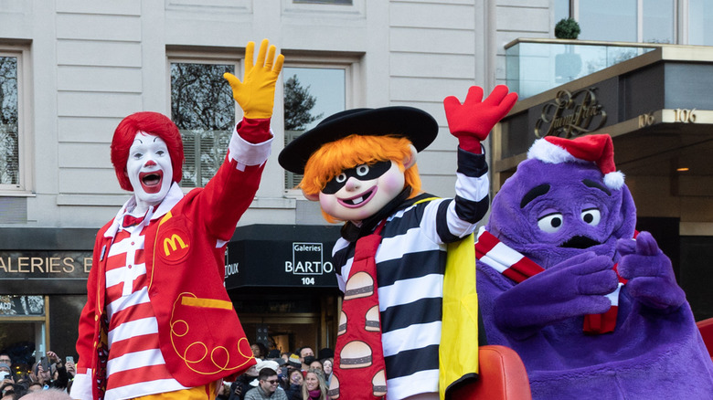 McDonald's mascots waving during parade