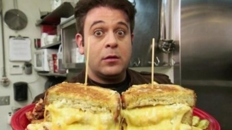 Adam Richman finishing the Melt Challenge