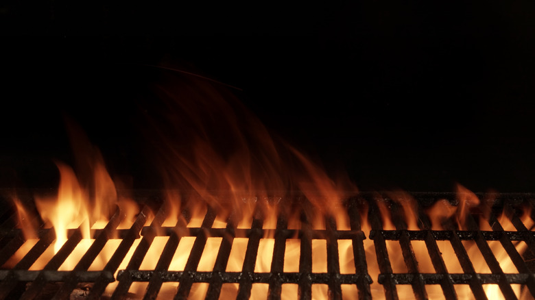 Fire rising under grill grates