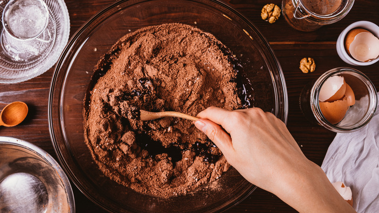 Cake mix being stirred into a batter