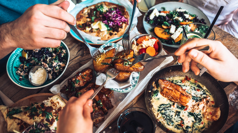 people enjoying restaurant food