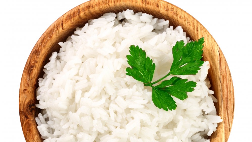 rice in a wooden bowl