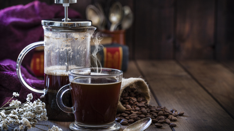 French press on wooden table