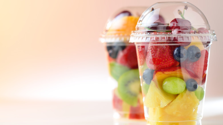 fruit in plastic cups