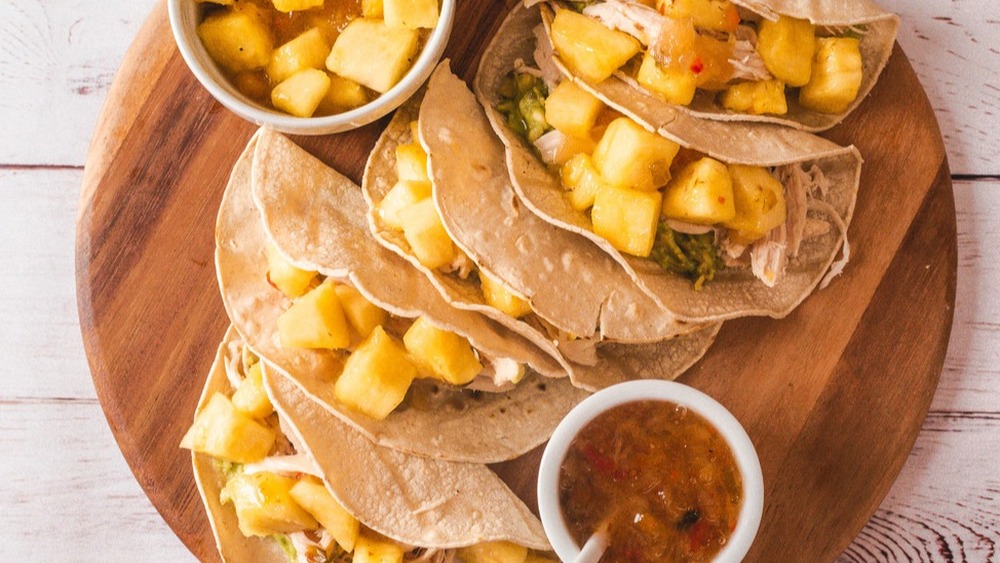 Costco tacos on a plate with pineapple 