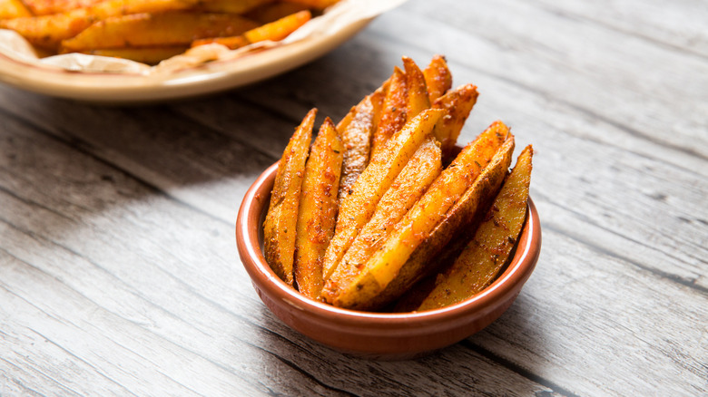 Cajun fries served on table