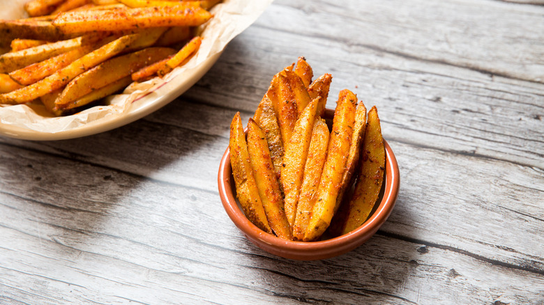 Cajun fries served on table