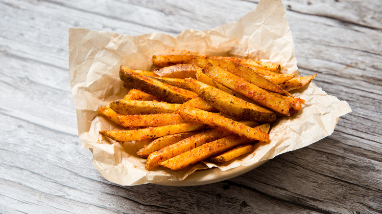 Cajun fries served on table