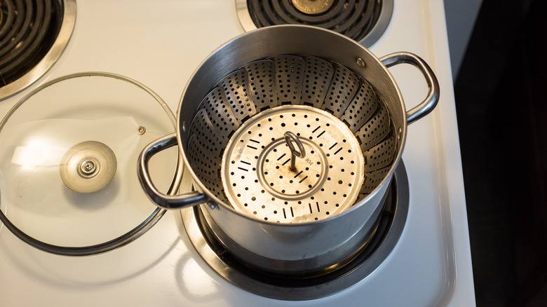 pot with steamer basket inside