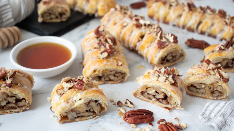 nut-topped braided pastry sticks