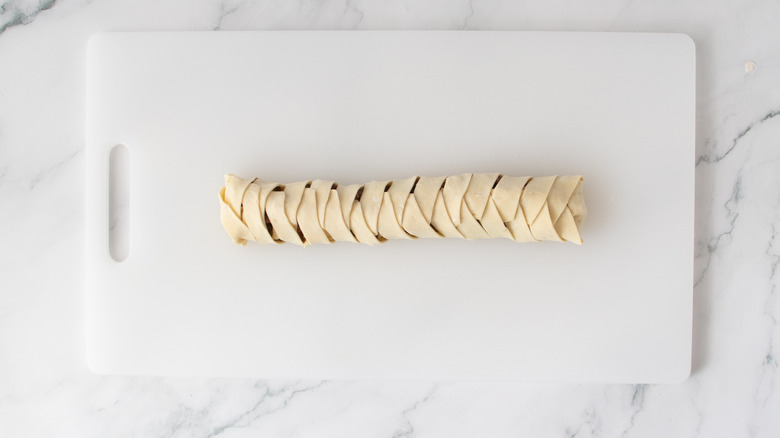 braided pastry dough on a white board