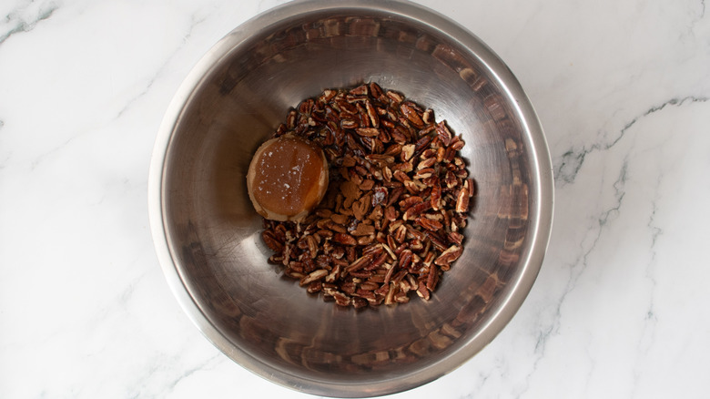 brown sugar and nuts in a metal bowl