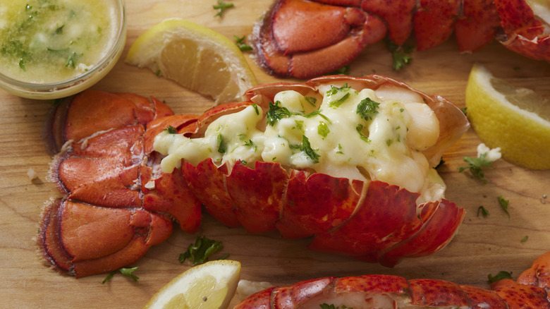 lobster tail on wooden surface