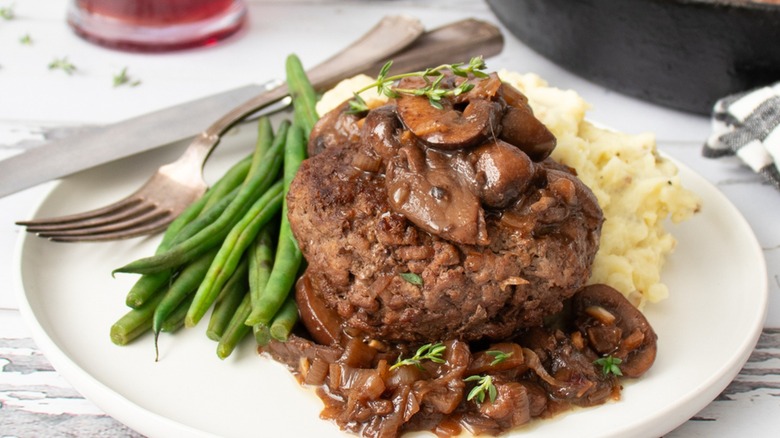 hamburger patties with mushroom sauce