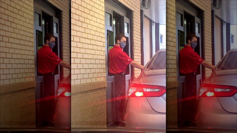 Employee at Chick-fil-A drive-thru