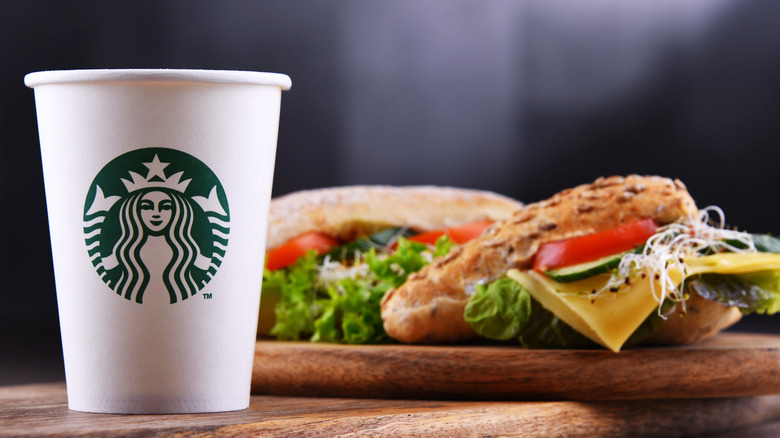 Starbucks cup and sandwich