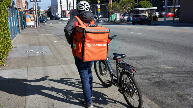 Biker with Doordash backpack