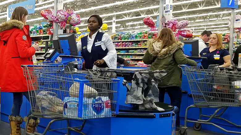  Walmart emplyeed at checkouts