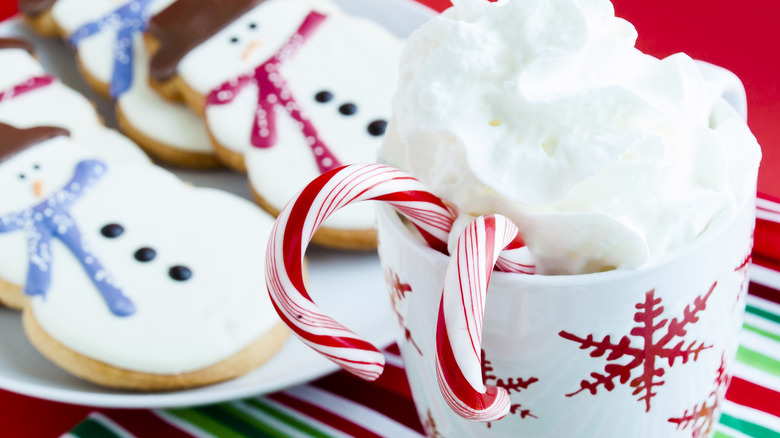 peppermint drink with snowman cookies