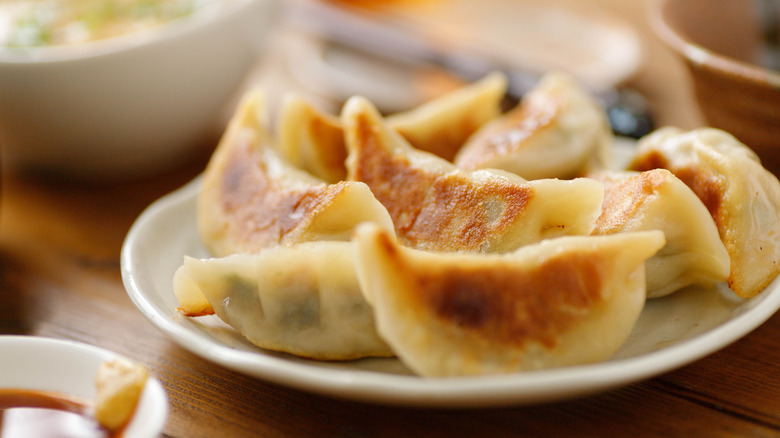 plate of pan-fried potstickers