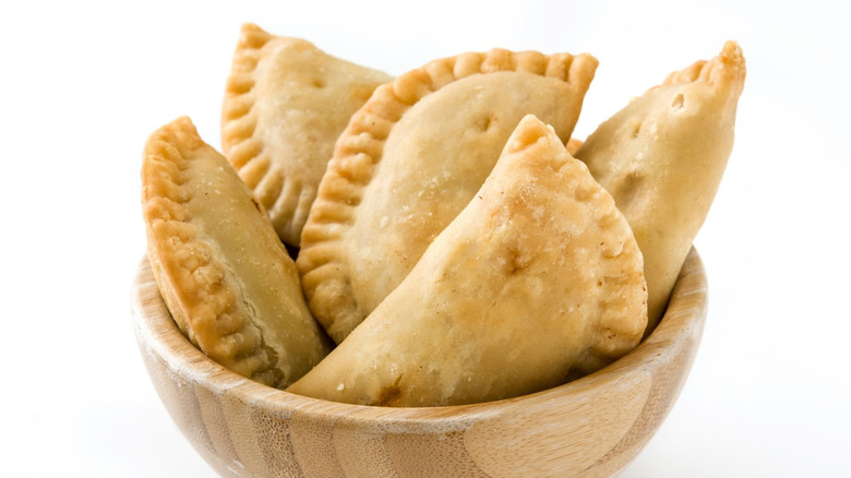 Pastelillos in wooden bowl