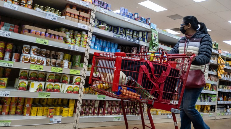 Shopper in Trader Joe's