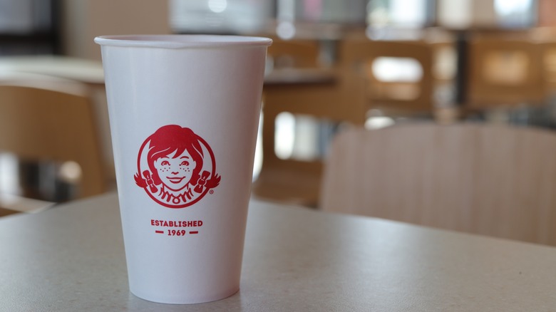Wendy's cup on table