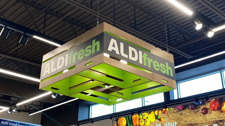 Aldi signage interior near produce sign