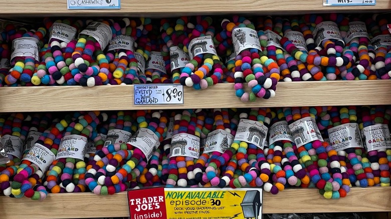 Shelves of wool garland at Trader Joe's 