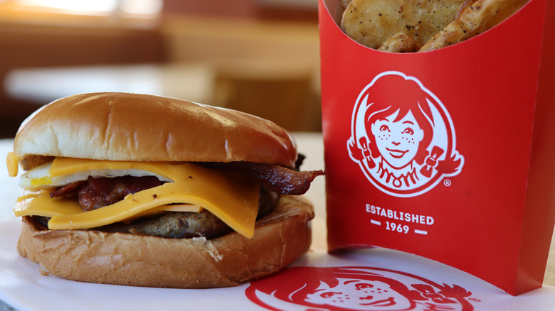 Wendy's bacon cheeseburger and potato wedges