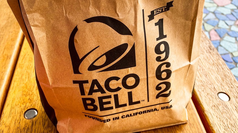 Taco Bell bag on table