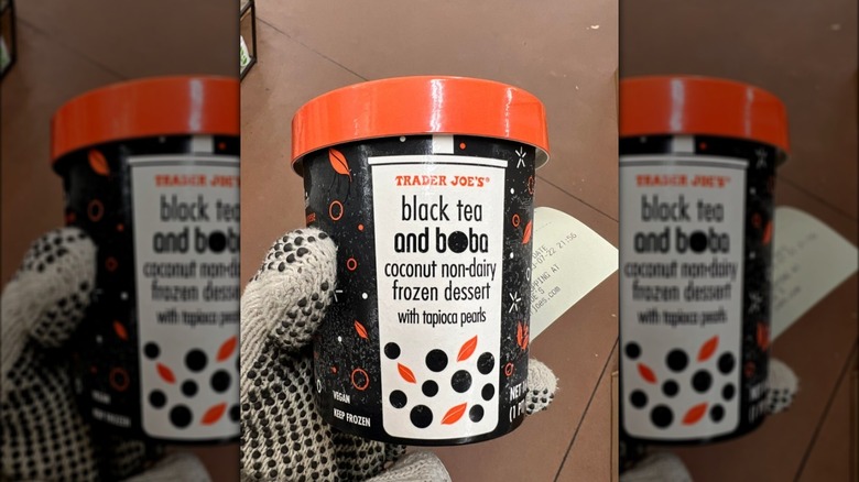 Person holding Trader Joe's dessert