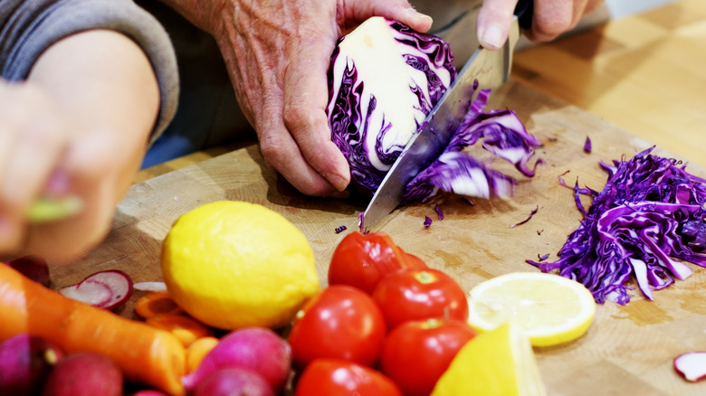 Cutting vegetables in a kitchen