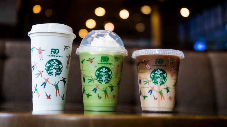 Three Starbucks drinks on table