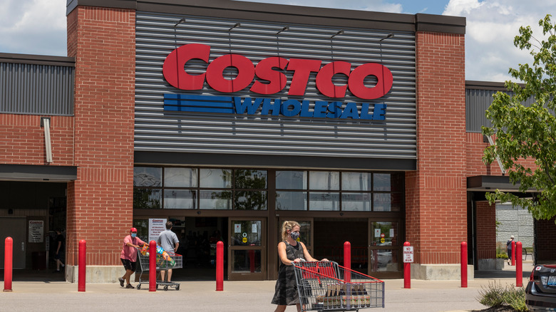 Costco store front and shoppers