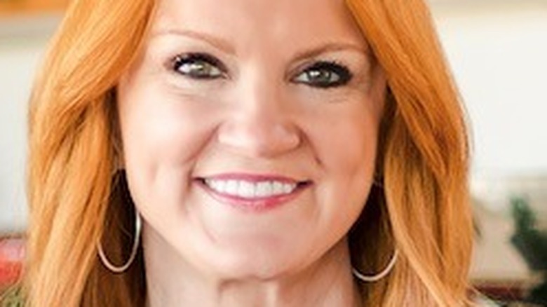 Ree Drummond smiling wearing hoop earrings