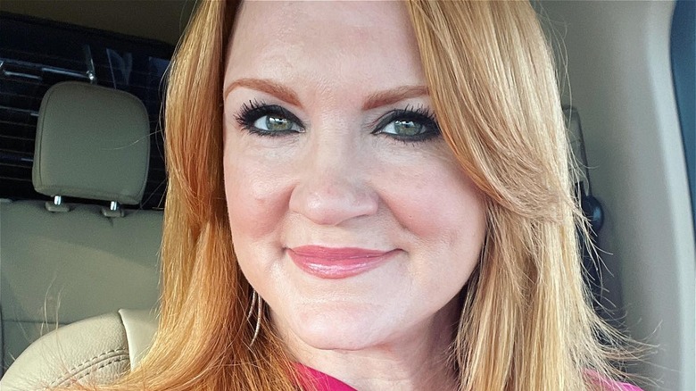 A close-up of Ree Drummond against a peach colored wall