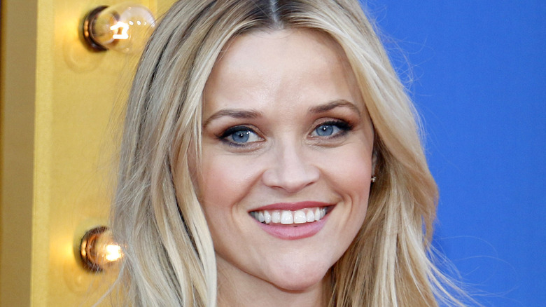 Reese Witherspoon smiling at event