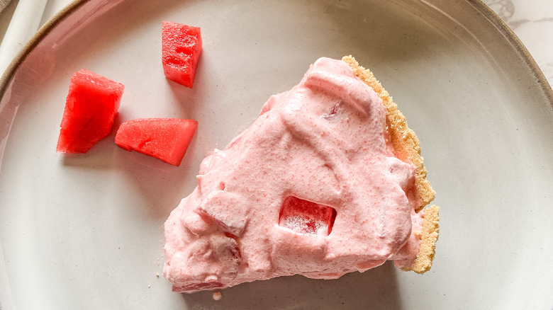 Slice of watermelon pie with fresh fruit