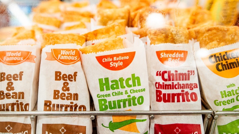 Allsup's beef & bean burritos, hatch green chile & cheese burritos, and chimichanga burritos on display