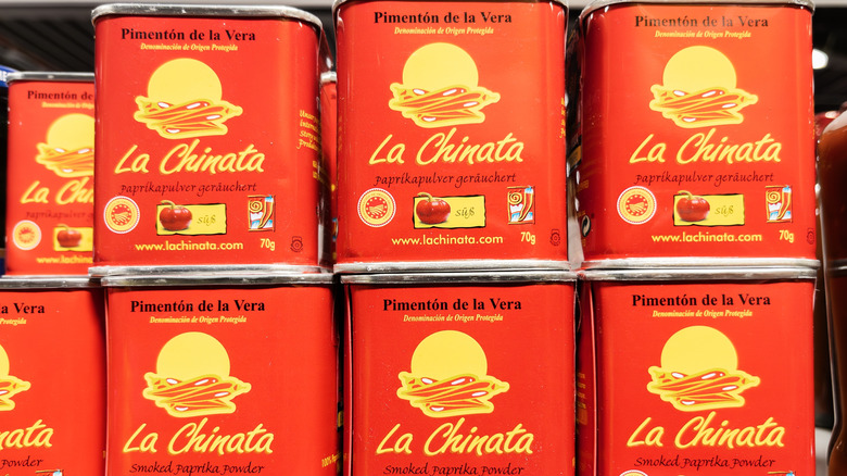Stacks of Spanish smoked paprika powder in tins