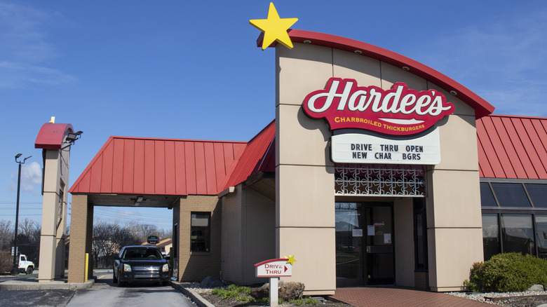 Front of a Hardee's restaurant with drive-thru