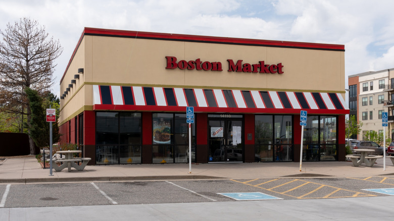 Parking spots remain empty outside a Boston Market.