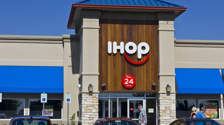 Customers linger outside an IHOP.