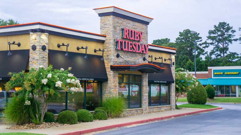 The dining room glows from within a Ruby Tuesday.