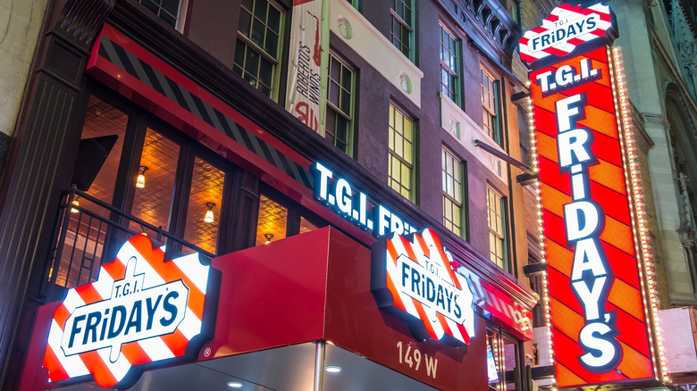 Signage glows on the exterior of a TGI Fridays.