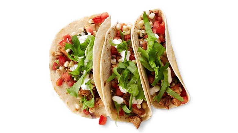 three Chipotle steak tacos