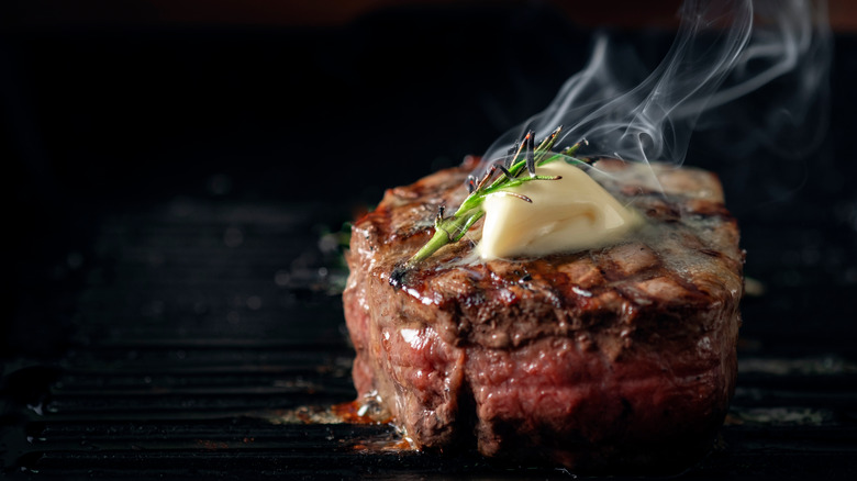 Grilled steak with butter