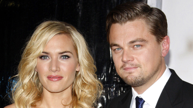 Kate Winslet and Leonardo DiCaprio posing together on a red carpet