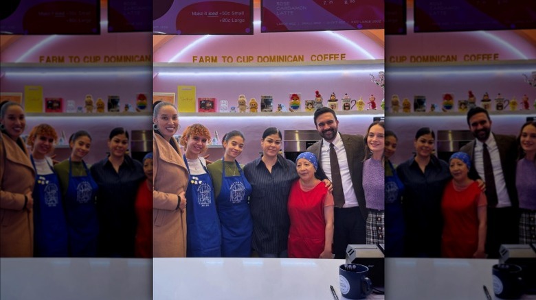 Zohran Mamdani in Sweets & Things with a group of employees and the owner